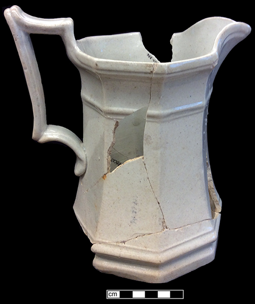 Pitcher molded with acanthus leaf pattern.  